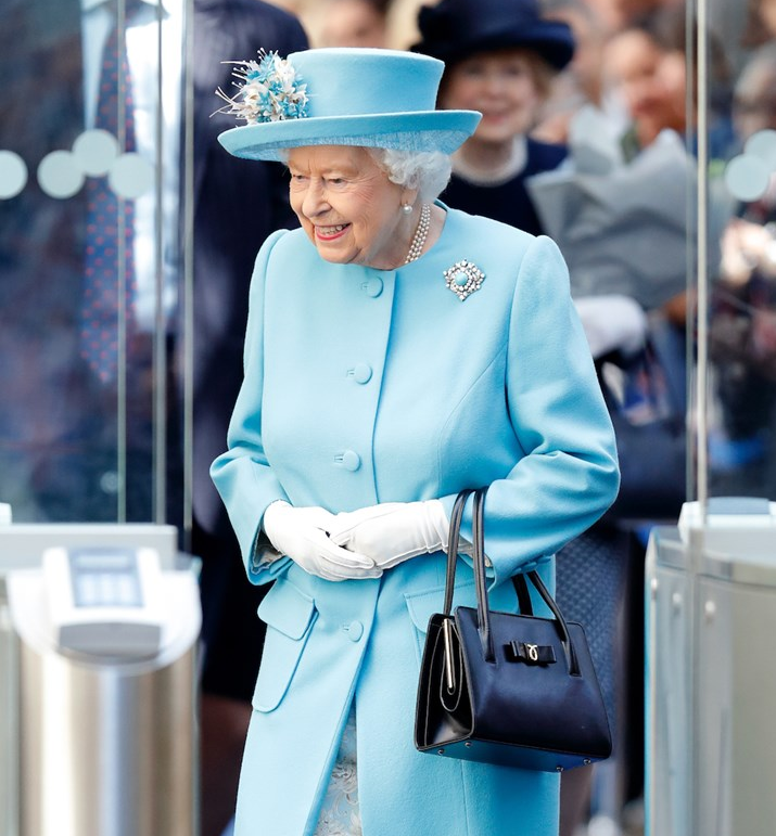 Know Why Queen Elizabeth II Always Carried Her Black Handbag Along It