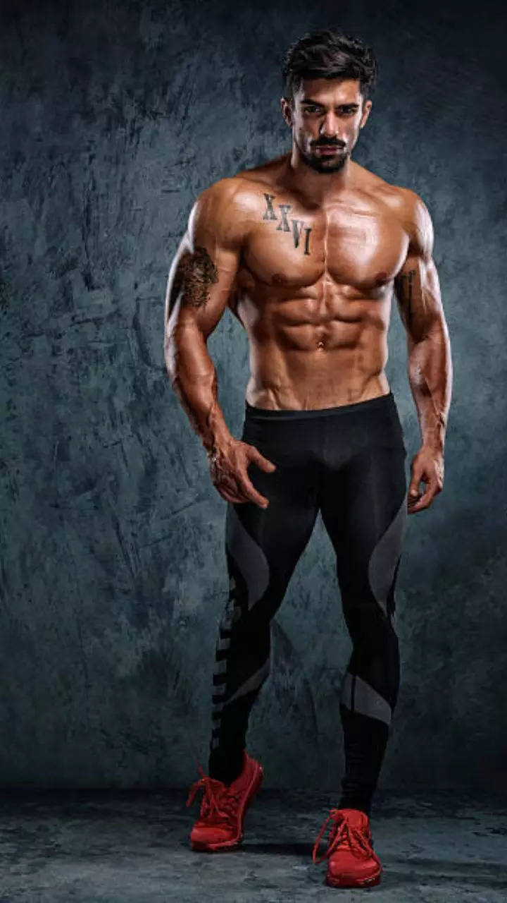 Fruits forming a strong body, Man posing muscular body builder