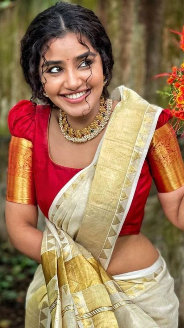 Young Girl In Traditional Kerala Saree And Jewelry Stock Photo, Picture and  Royalty Free Image. Image 121454035.