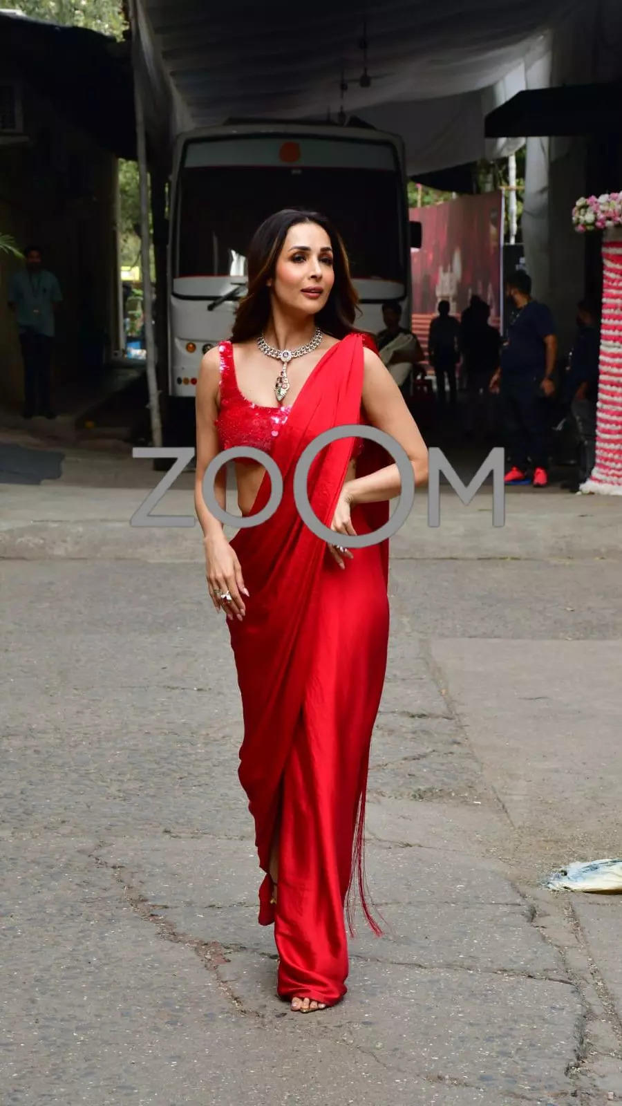 Malaika Arora Exudes Christmas-y Vibes In Red Satin Saree, Sequined Blouse