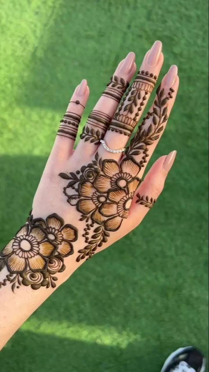 Henna hena mehendi design - isolated green nails and shadow Stock Photo |  Adobe Stock