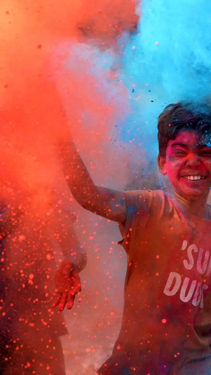 Holi Festival Indian Boy High-Res Stock Photo - Getty Images