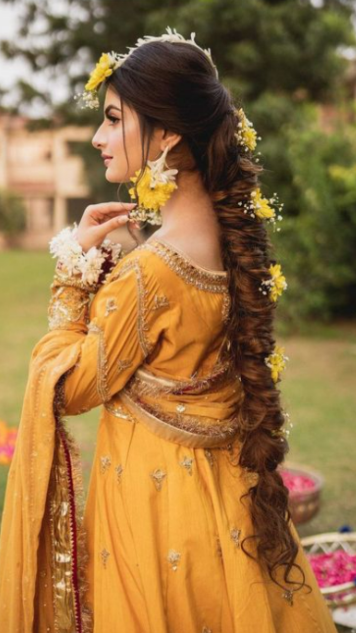 Pretty bridal braid with floral tiara and pink lehenga for mehendi. | Hair  styles, Bridal ponytail, Open hairstyles