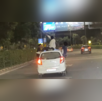 Push-Ups And Drinking On A Maruti Suzuki Alto 800 Gurugram Man Arrested Vehicle Seized