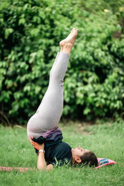 Vipitra karni or legs up the wall pose