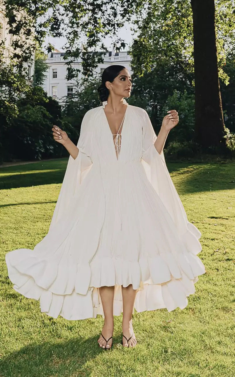 Breezy and comfortable in a ruffled white dress