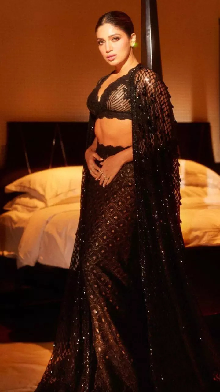 Beauty in black donning a gorgette desi lehenga with a cape