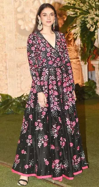 Aditi Rao Hydari wearing a dark colour floral dress Pic credit Pinterest
