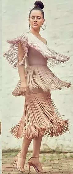 Kangana Ranaut looks chic in a fringe dress and a tight updo bun Pic Credit Pinterest