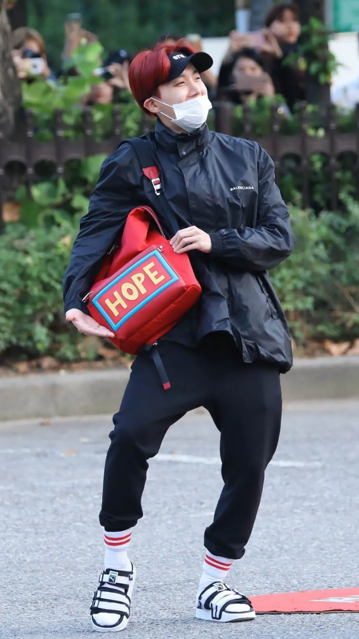 Look at him showing off his HOPE bag 