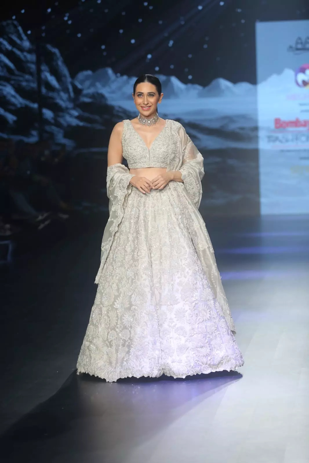 Karisma Kapoor dazzles the ramp as she walks in this ivory lehenga 