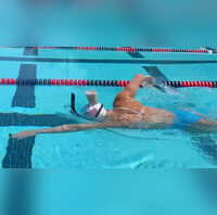 When 7-Time Olympic Gold Medalist Katie Ledecky Balanced Chocolate Milk on Her Head While Swimming
