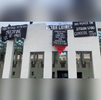 WATCH Pro-Palestinian Protesters Breach Security Display Banners At Australian Parliament