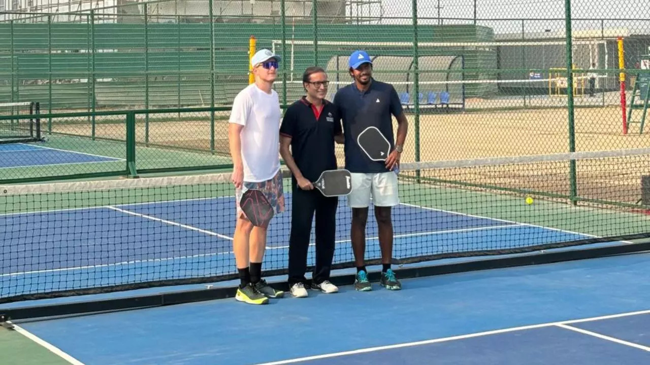 Times Group MD Mr Vineet Jain poses with Armaan and Dusty