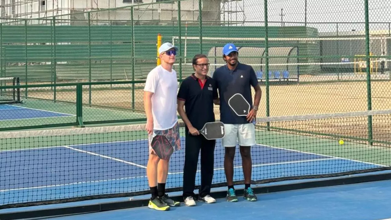 ARMAAN Bhatia with Times Group MD Mr Vineet Jain and Dusty Starts after doubles match 