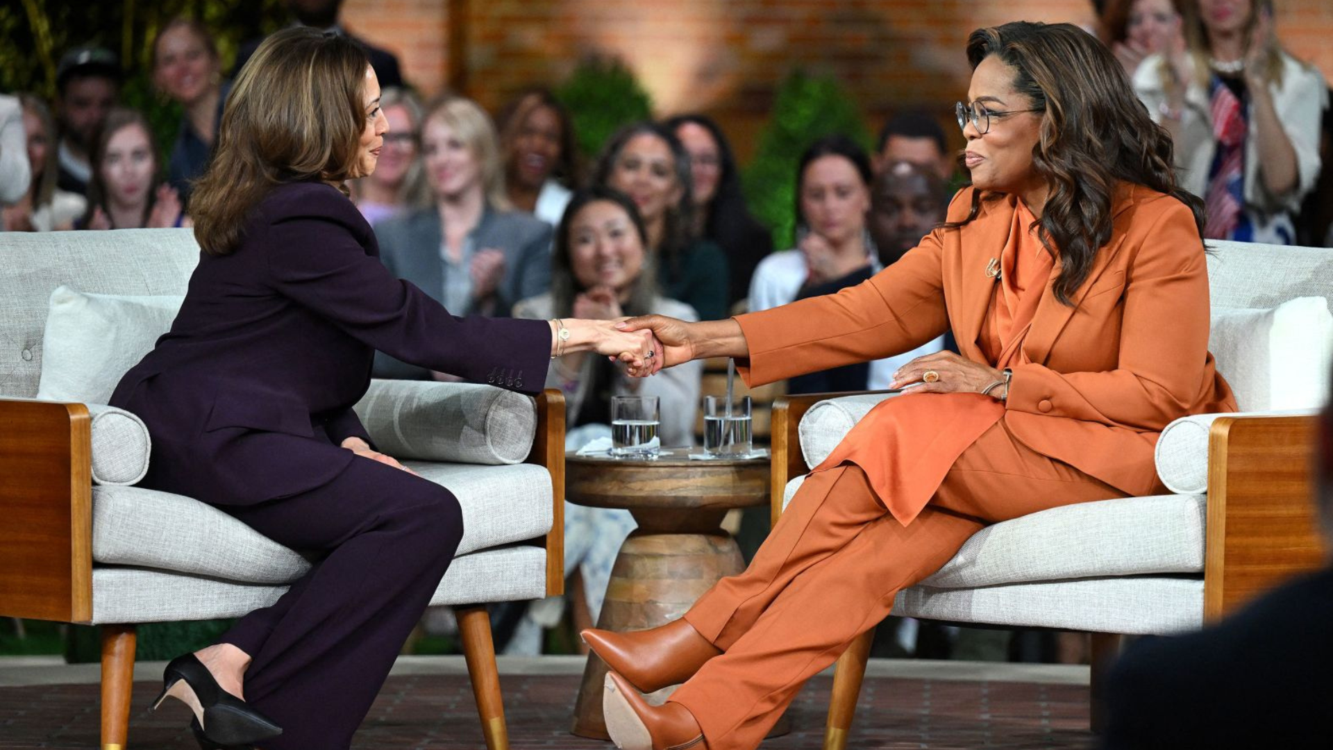 Harris Shakes Hands with Oprah Winfrey in Farmington Hills Michigan September 19