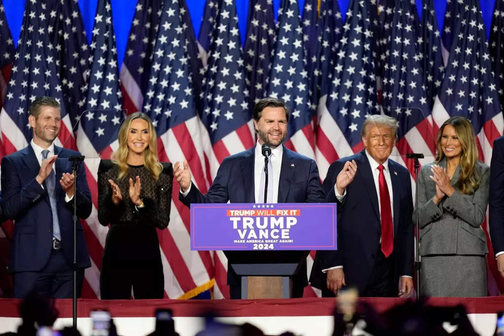 Eric and Lara Trump left-wing extremist at Donald Trump's victory rally Credit AP