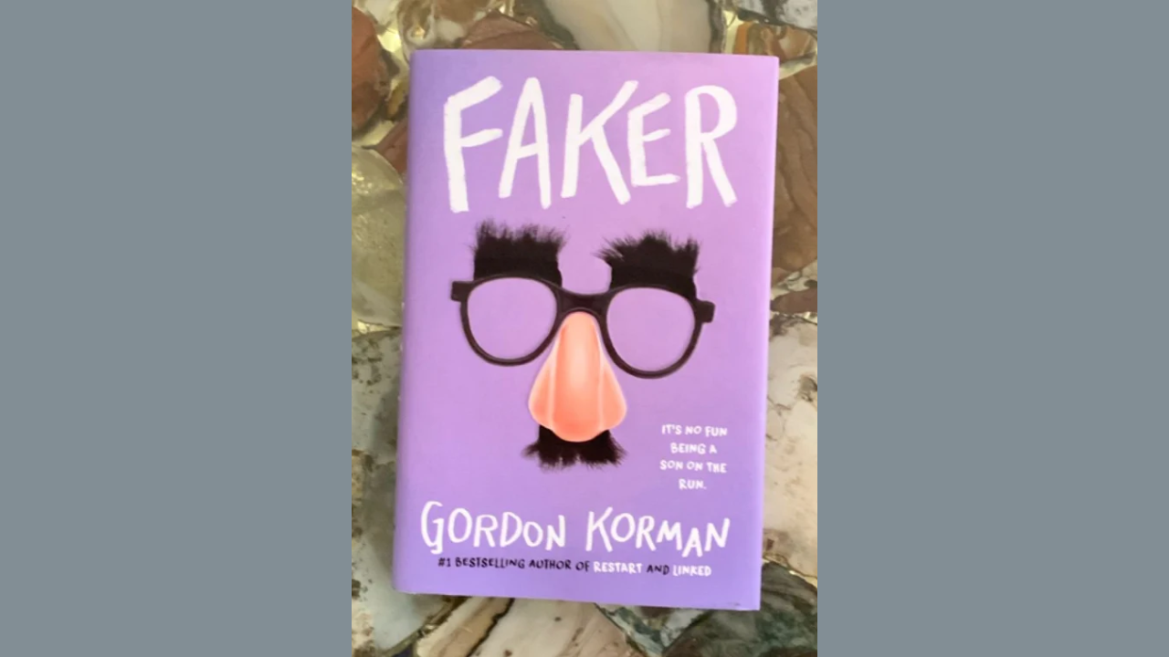 Faker by Gordon Korman  