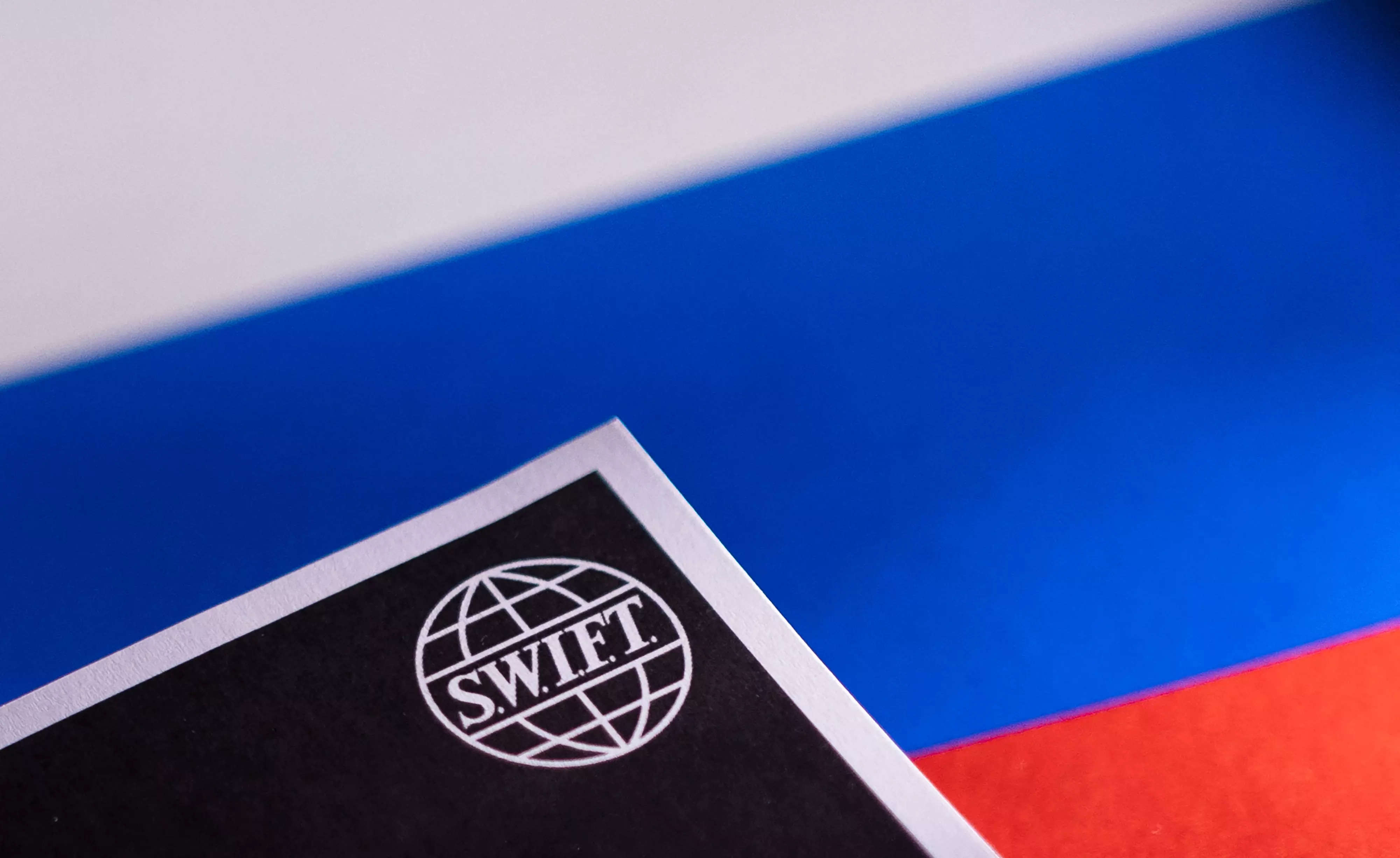 SWIFT says it preparing to comply with curbs on Russian banks