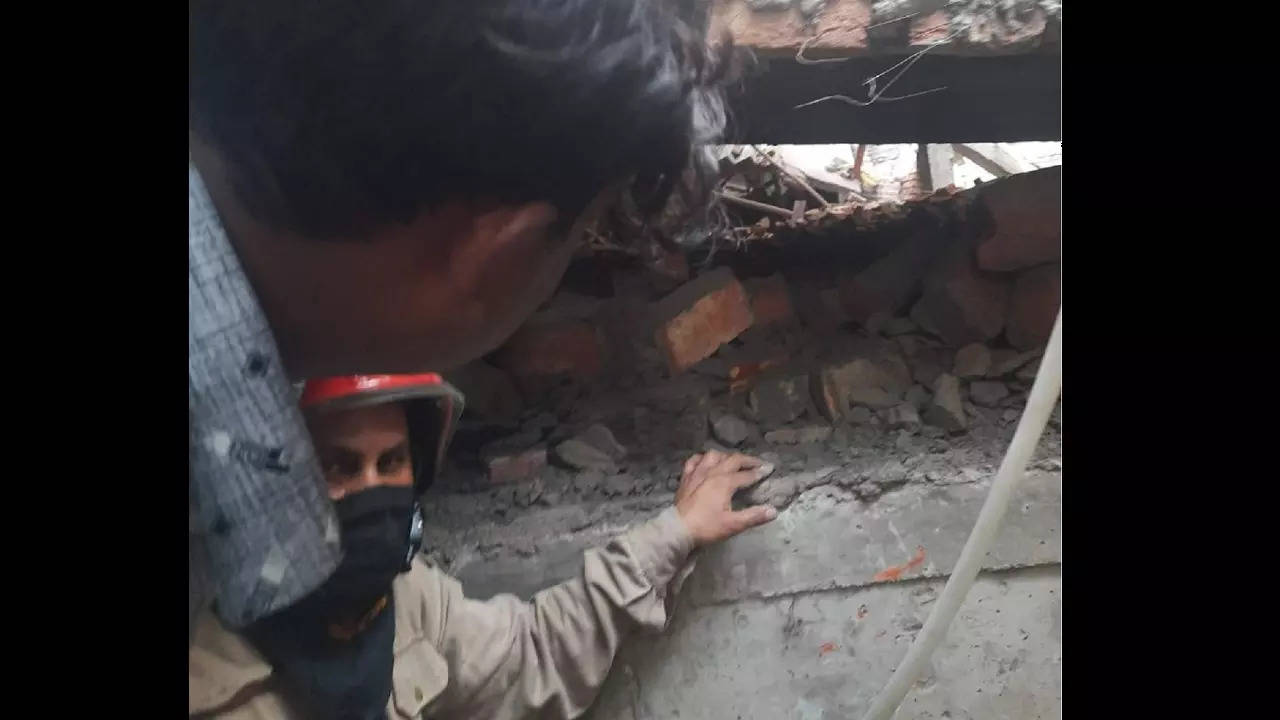 An under-construction building collapses at Nicholson Road near Kashmiri Gate in Delhi