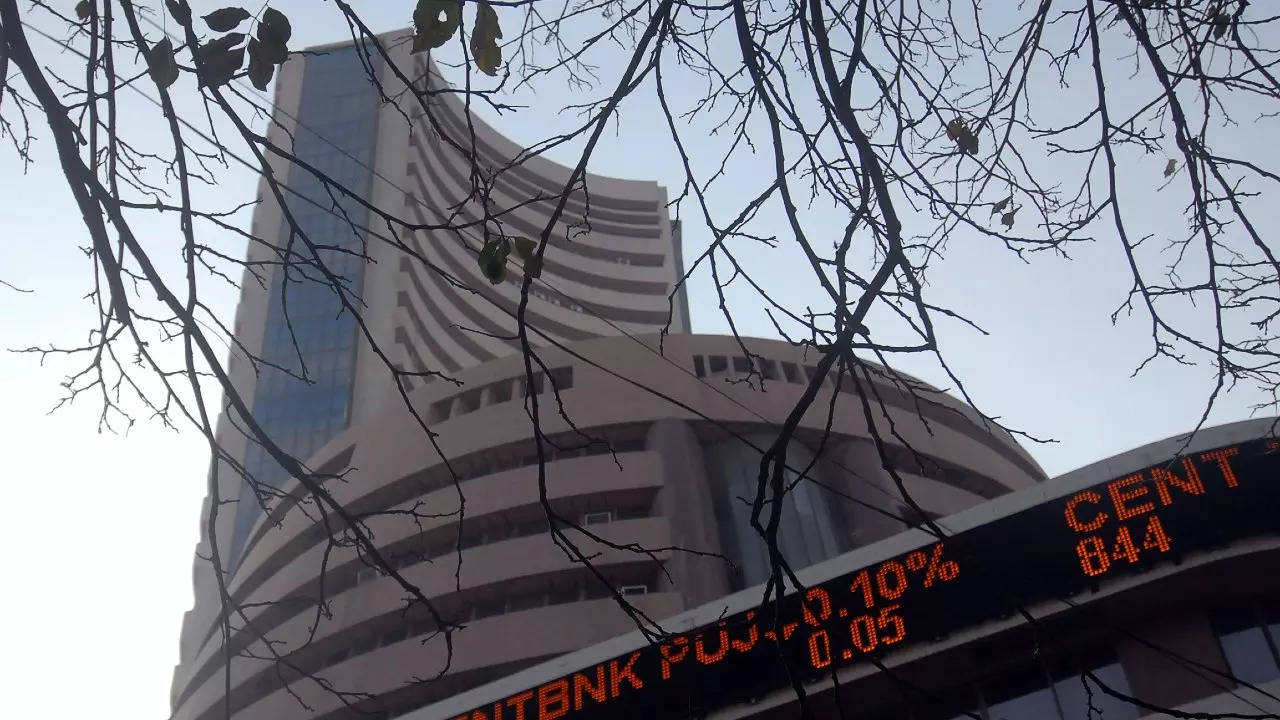 Sensex, Nifty erase early gains in volatile start; Metals, IT crack
