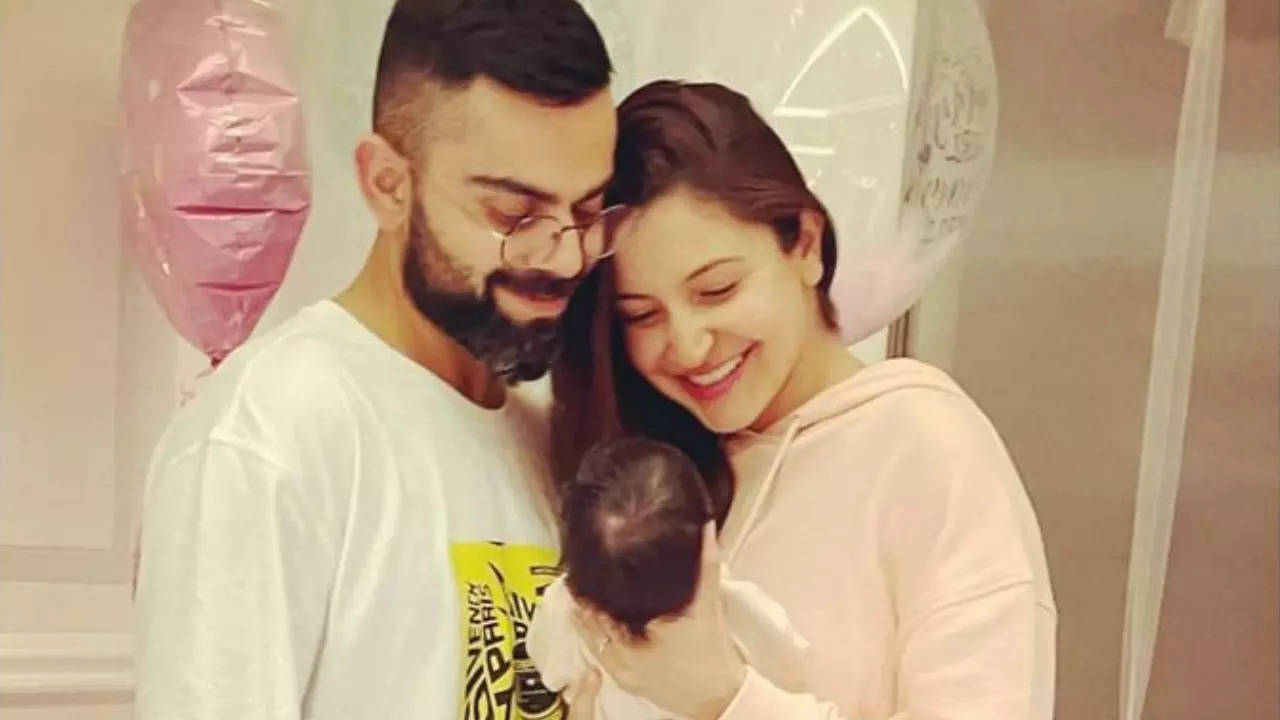 Anushka Sharma holds daughter Vamika in her arms as she steps out with hubby Virat Kohli