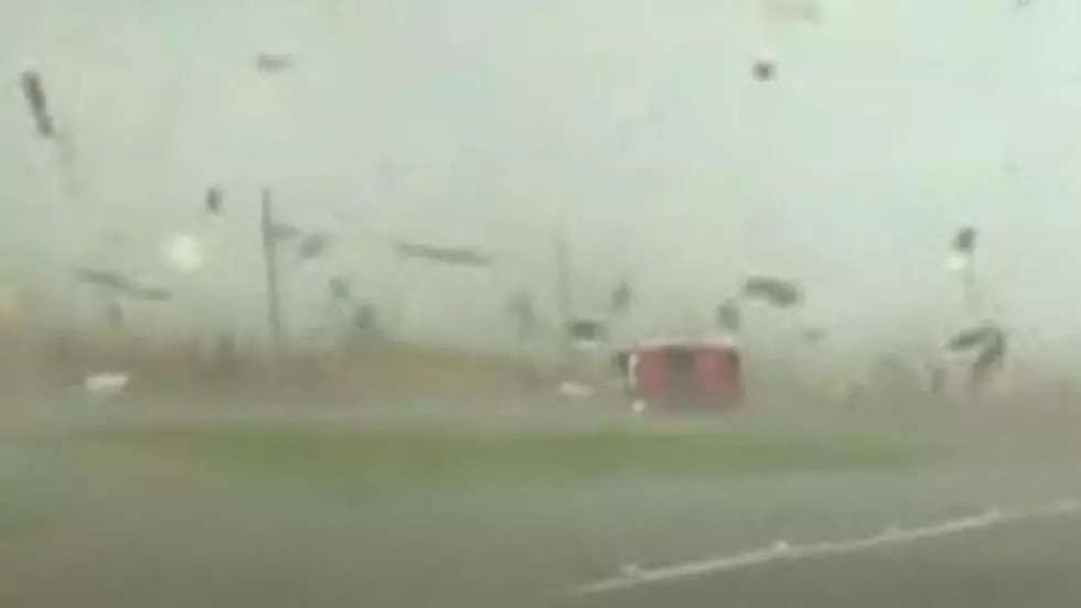 A red 2004 Chevrolet Silverado cab truck was caught in a tornado in Texas | Image courtesy: Instagram