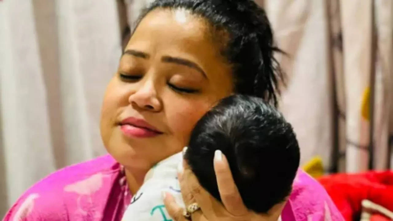 Bharti Singh cradles her baby