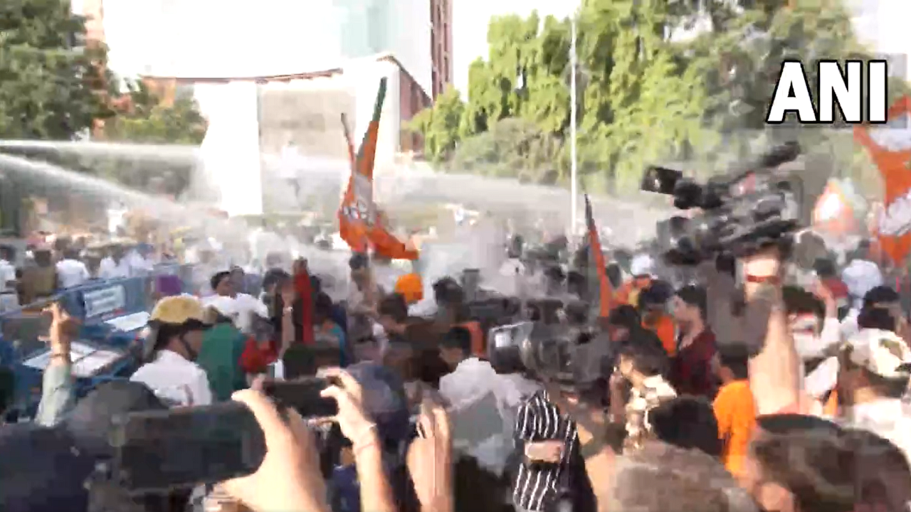 Police use water cannon to disperse BJP workers who were taking out a protest rally against West Bengal government
