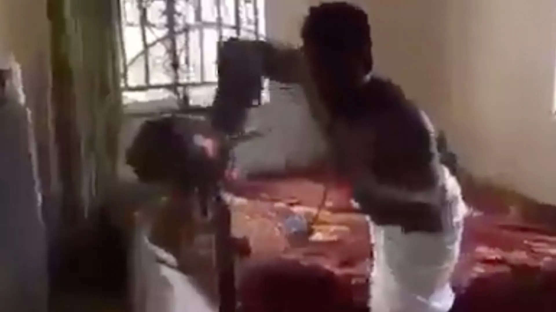 Man powers electric fan with bare hands