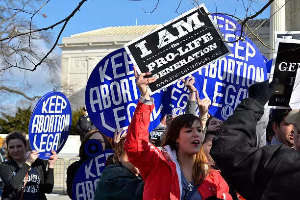 Pro-life demonstrator interrupts abortion rights campaign