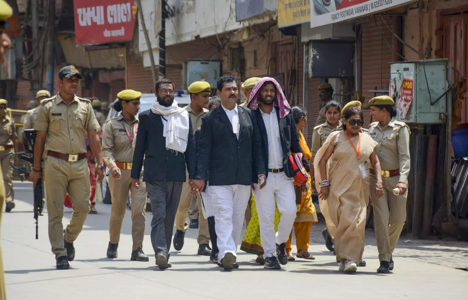 Varanasi: Officials leave after a videographic survey at Gyanvapi Masjid complex...