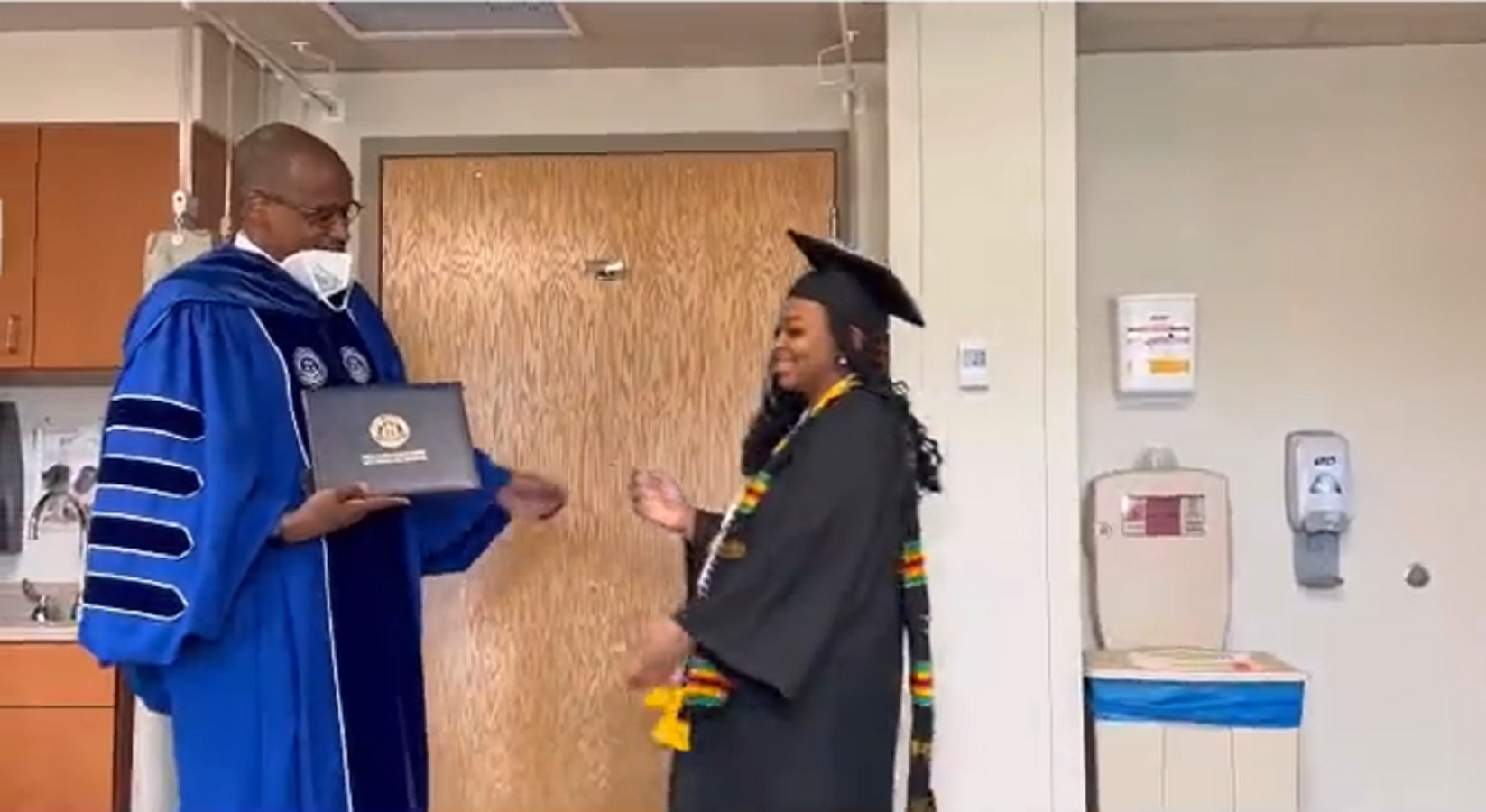 Woman receives college degree in hospital room