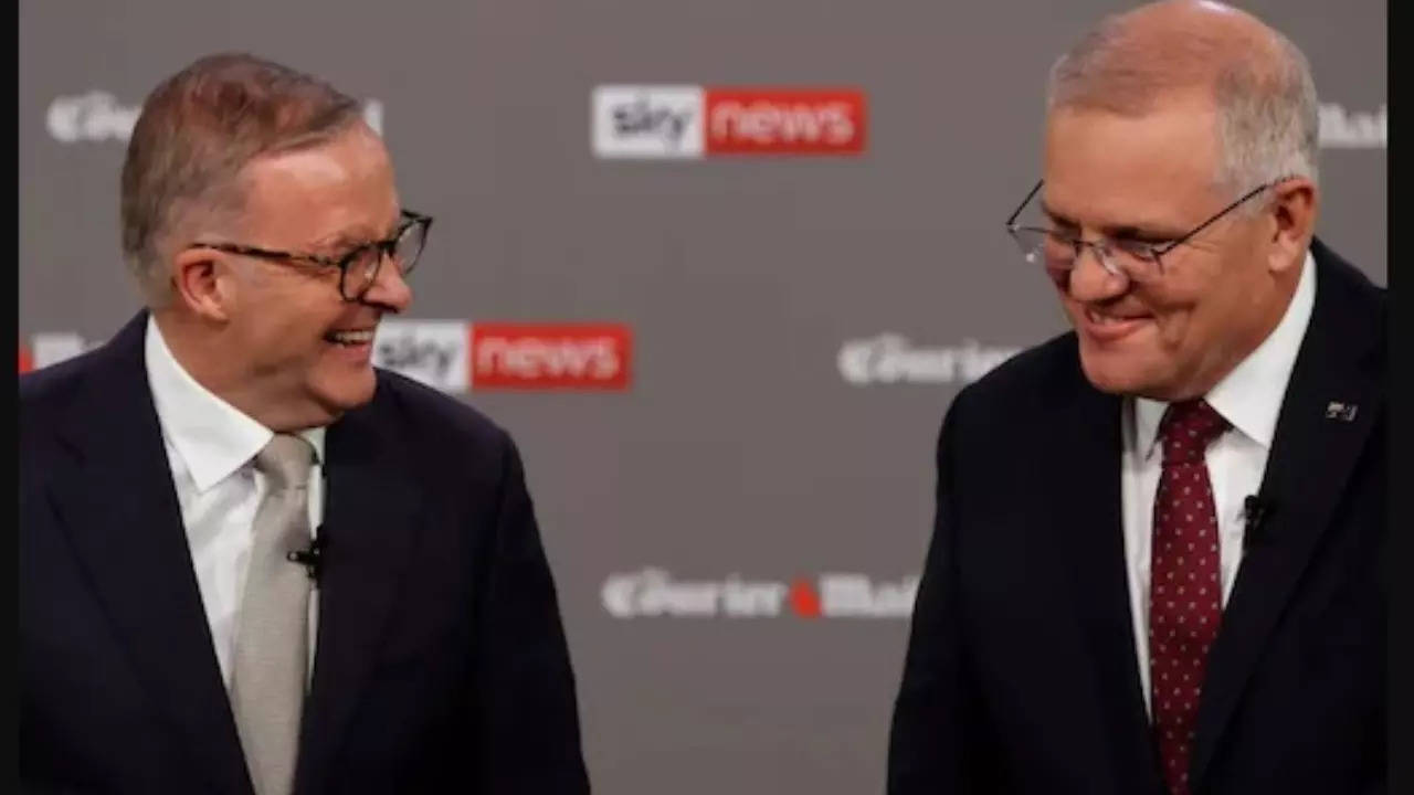 . Australian Prime Minister Scott Morrison, right, and leader of the Labour Party Anthony Albanese
