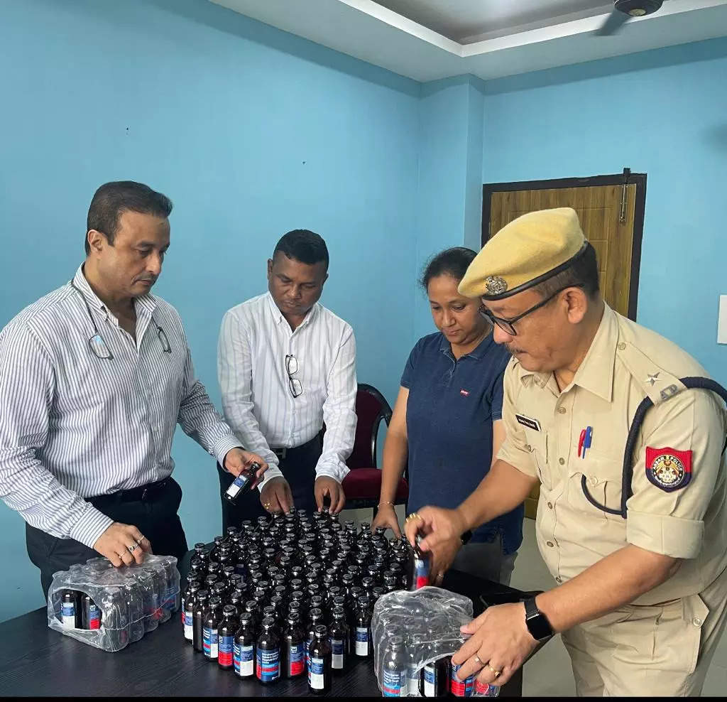 Guwahati police with the cough syrups
