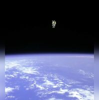 Astronaut floats in space completely untethered and away from safety of ...