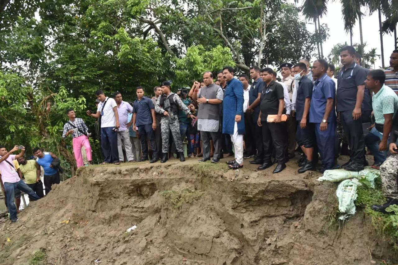 Assam flood: CM Himanta Biswa Sarma wades through floodwaters to meet ...