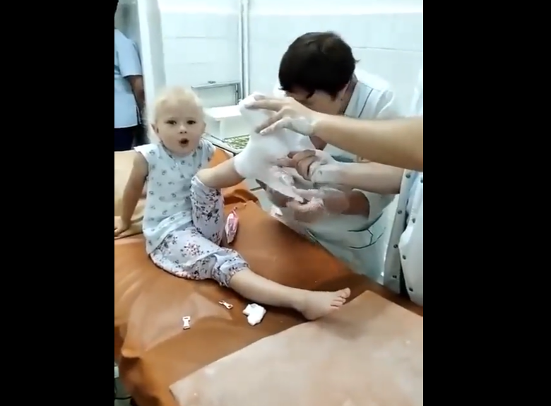 Shes a warrior Little girl sings Ukraines national anthem while getting bandaged clip goes viral