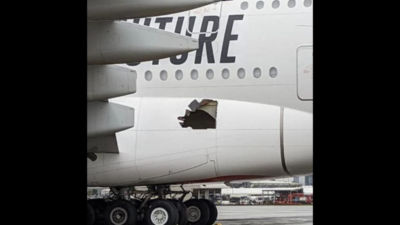 Emirates plane with hole in side