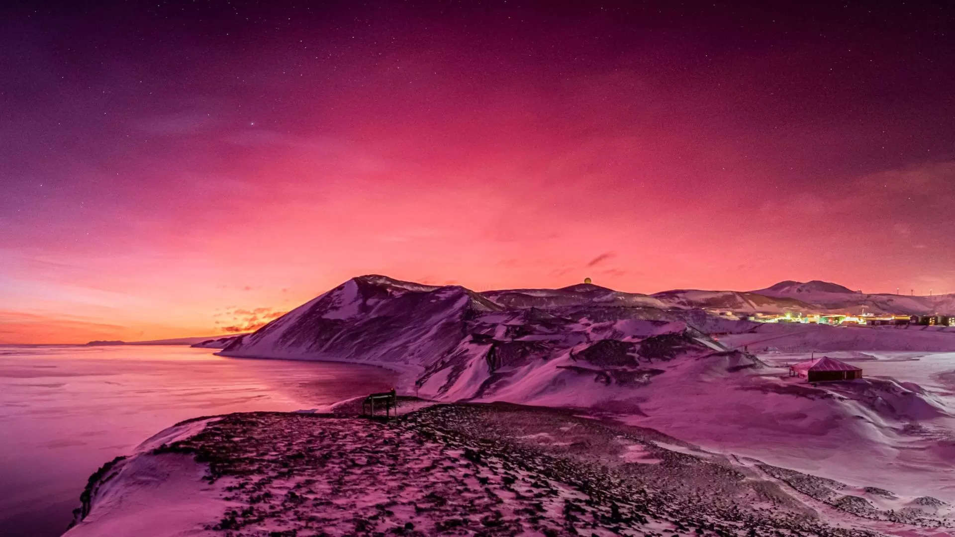 The skies of Antarctica light up in the fiery purple afterglow of the Tonga volcano eruption