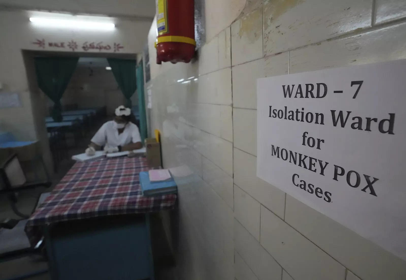 A health worker works at a monkeypox ward set up at a government hospital in Hyderabad