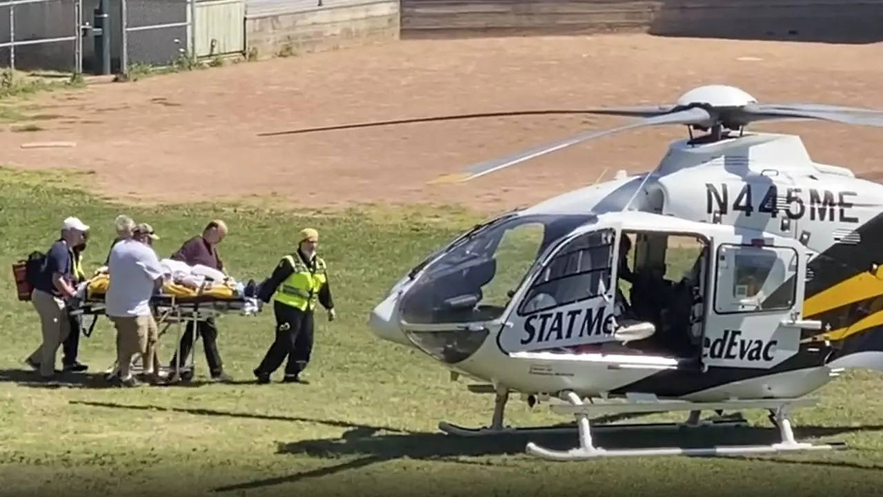 In this still image from video, author Salman Rushdie is taken on a stretcher to a helicopter for transport to a hospital after he was attacked during a lecture