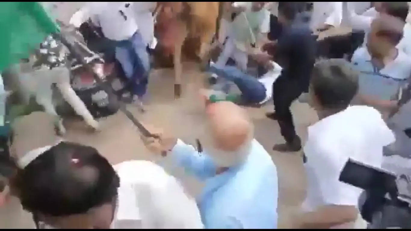 WATCH Stray cow attacks former Gujarat minister Nitin Patel breaking his leg during Tiranga Yatra