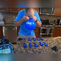 Man inflates 10 balloons in 60 seconds with his nose, closes in on
