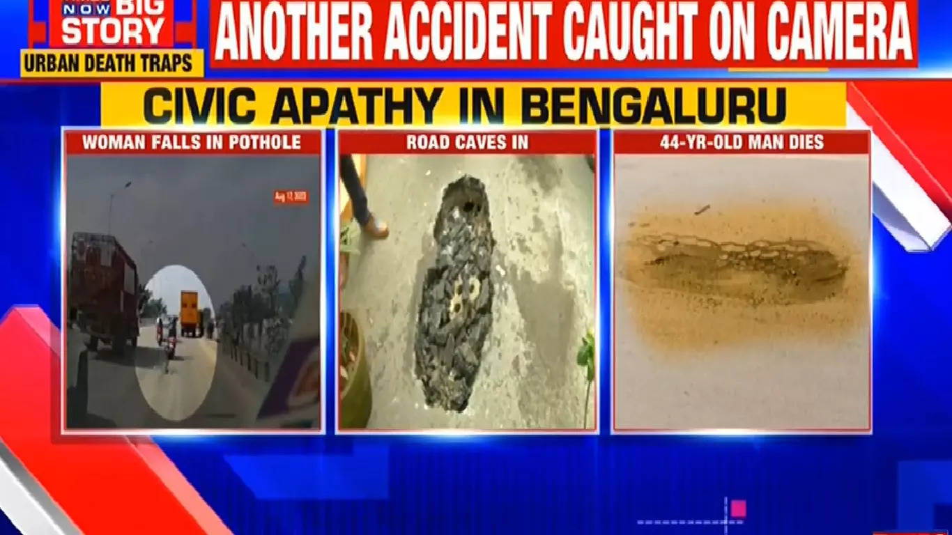 Ground report Bengaluru woman driving scooter falls into pothole as civic negligence goes unabated -WATCH