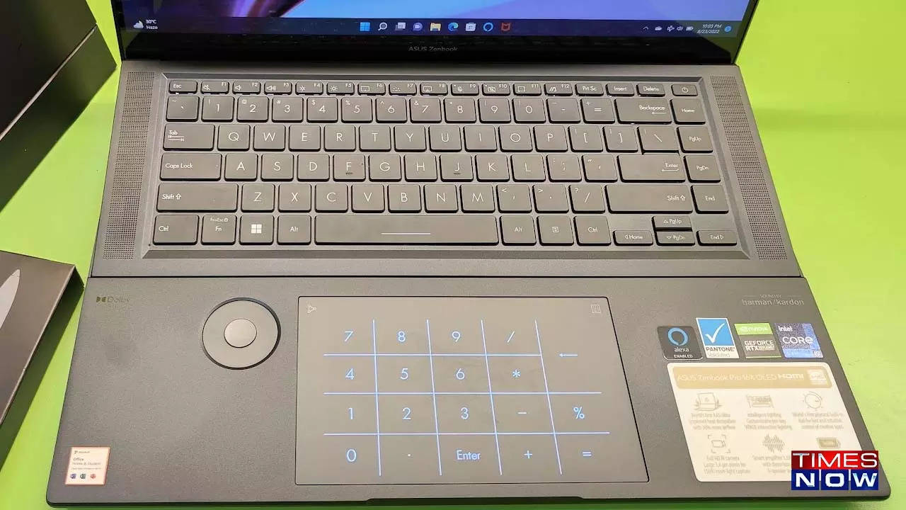 A large trackpad that shows the numeric keypad when needed and the ASUS dial on the left