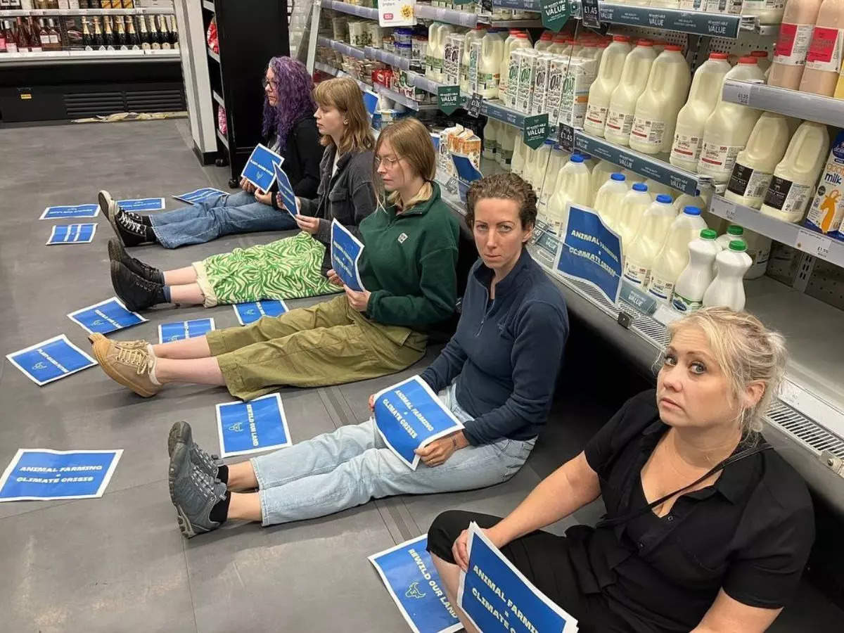 Vegan activists block milk aisles in a supermarket in the UK | Picture courtesy: Facebook/Animal Rebellion