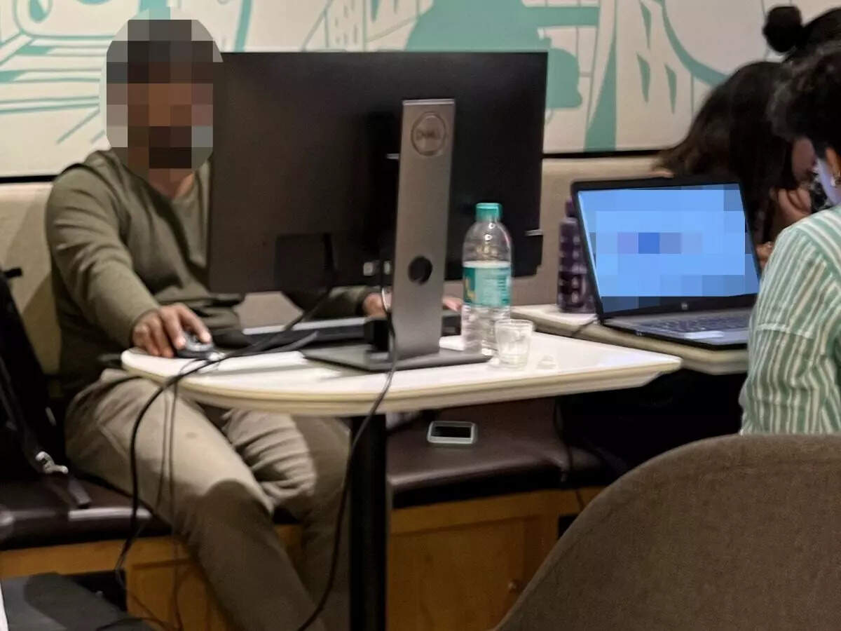 Bengaluru man with full-fledged desktop setup works from coffee shop after office gets flooded