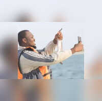 Man takes selfie with fish, throws his phone into the water by mistake