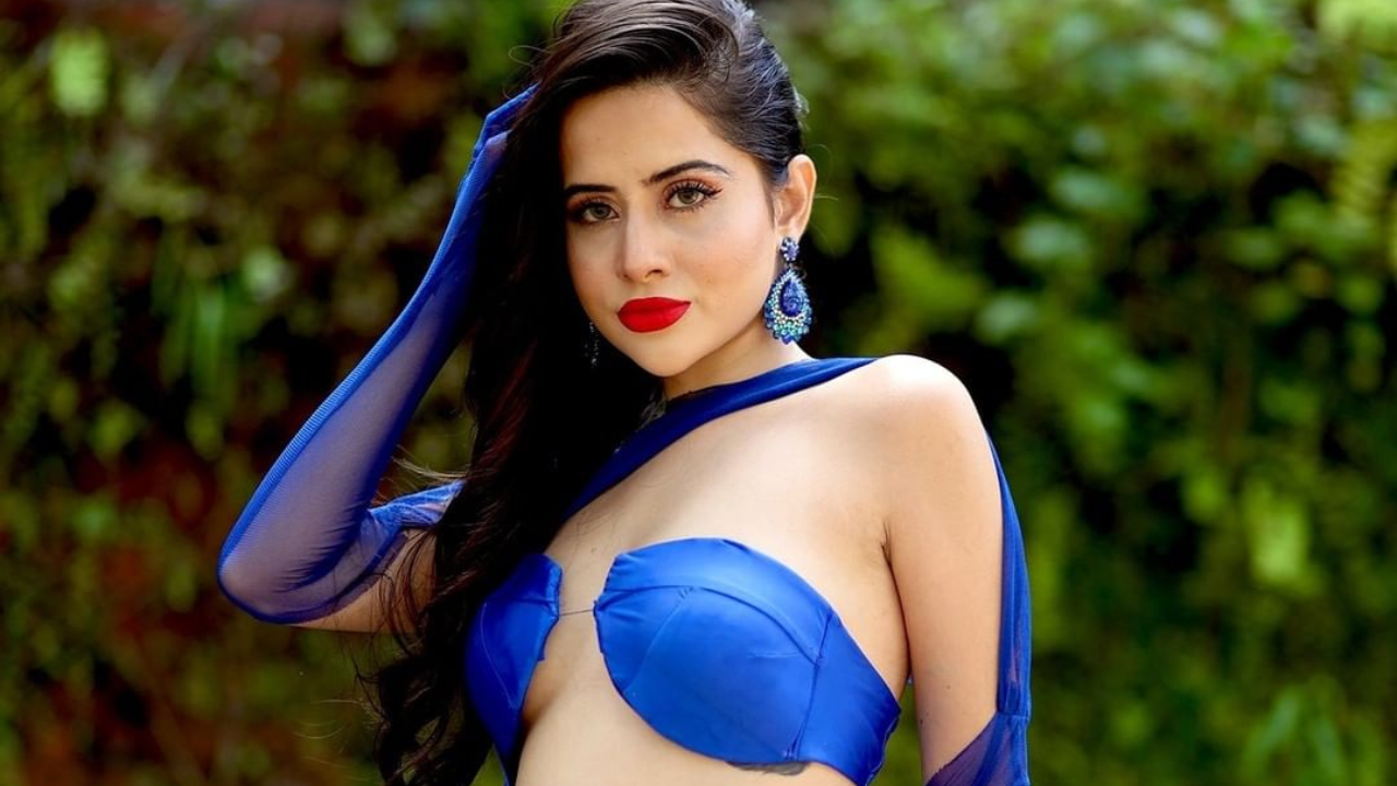 Urfi Javed is 'feeling blue' as she flaunts toned physique in dangerously  high-slit skirt with strapless top -WATCH